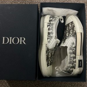 Christian Dior
Size - 44 (11 US) 
White/Black